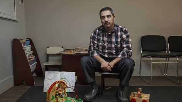 Ghassan Al-Naami is seen on his second-last day of his paediatrics practice in Fort McMurray on Feb. 16. He does not want to leave, but is frustrated with management of the region’s health system.