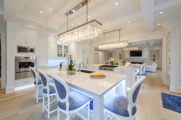 The main kitchen has two islands topped with Carrara marble.