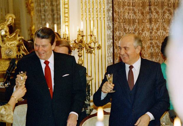 Ronald Reagan and Mikhail Gorbachev share a toast during a dinner at the Soviet Embassy during the Soviet leader's state visit in 1987.