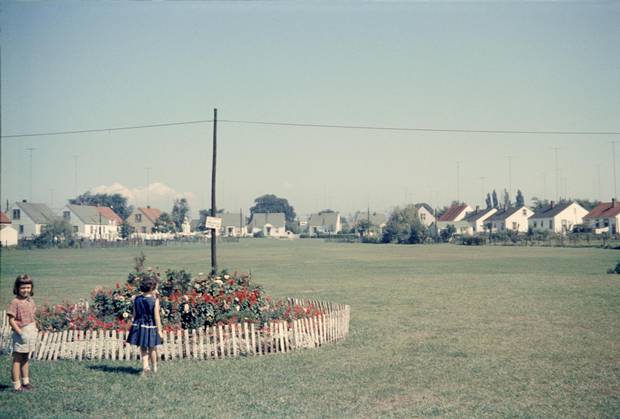 Two girls in Queensway Park in Etobicoke look north to Uno Drive in 1959. The homes in the background were built in the 1940s for returning war veterans.