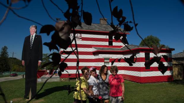 Trump supporters gather at the 'Trump House' in Youngstown, Pennsylvania on October 6, 2016. 