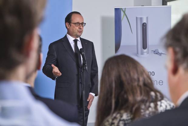 French President Franocis Hollande delivers a speech as he visits a tech company in Boulogne-Billancourt, outside Paris, on April 4, 2016.
