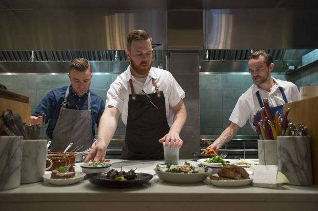 Stephen Smee, executive chef and owner; Andrew Moore, chef de cuisine; and Neil Maclean work the line at Ten Foot Henry.