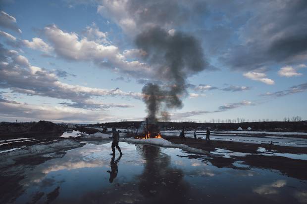 A wigwam burns on the eve of an Army Corp of Engineers eviction notice at the DAPL resistance camps near Cannon Ball, North Dakota February 21. The owner said, 