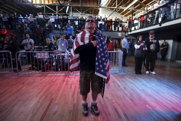 Supporter Jansen Tropf wears an American flag at a campaign rally for Donald Trump in Salt Lake City, Utah in March.
