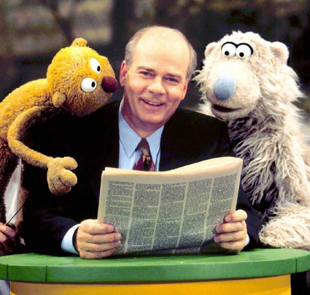 Peter Mansbridge with the puppets of Sesame Park, the Canadianized version of Sesame Street, in 1996.