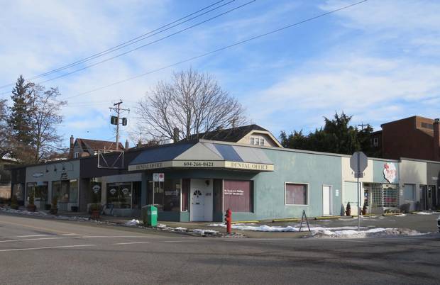 A small Kerrisdale strip mall slated for redevelopment. The proposal would reduce eight shops to three while adding condominuims.