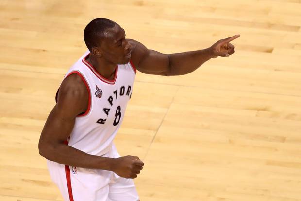 Bismack Biyombo of the Toronto Raptors reacts in the first half against the Cleveland Cavaliers in game four of the Eastern Conference final during the 2016 NBA Playoffs at the Air Canada Centre on May 23, 2016.