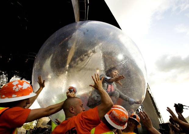 Wayne Coyne, lead singer of the Flaming Lips, starts his show by rolling over the audience in a plastic bubble at the 2008 Pemberton Music Festival.