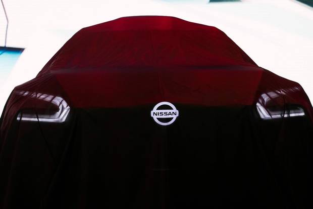 A 2019 Nissan model waits to be unveiled at the 2018 North American International Auto Show (NAIAS) in Detroit, Michigan, on January 15, 2018.