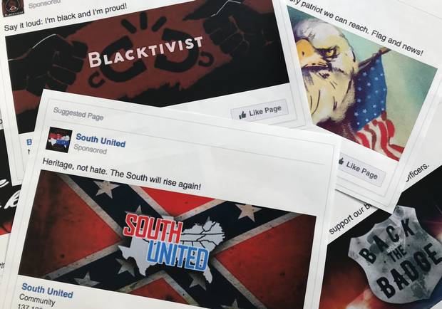 Some of the Facebook ads linked to a Russian effort to disrupt the American political process and stir up tensions around divisive social issues, released by members of the U.S. House Intelligence committee, are photographed in Washington, on Wednesday, Nov. 1, 2017.