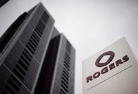 A Rogers Communications Inc. logo outside the Rogers Building in Toronto on Tuesday, April 22, 2014. THE CANADIAN PRESS/Darren Calabrese