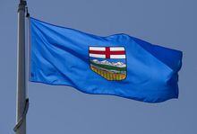 Alberta's provincial flag flies in Ottawa, Monday July 6, 2020. An Alberta judge has made 20 recommendations folowing the 2014 death of an Indigenous child in care. THE CANADIAN PRESS/Adrian Wyld