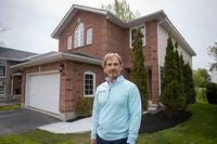 Real estate agent Luca Andolfatto poses for a portrait in Kingston, Ont., Saturday, May 21, 2022. Andolfatto has seen the stress many Canadian troops, their families and even their realtors are feeling over housing affordability. THE CANADIAN PRESS/Lars Hagberg