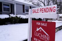 A "Sale Pending" sign is shown on an existing real estate sign, Monday, Feb. 27, 2023, in Salem, N.H. On Thursday, Freddie Mac reports on this week's average U.S. mortgage rates. (AP Photo/Charles Krupa)