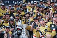Members of the Vegas Golden Knights pose with the Stanley Cup after defeating the Florida Panthers to win the championship in Game Five of the 2023 NHL Stanley Cup Final at T-Mobile Arena on June 13, 2023 in Las Vegas, Nevada. (Photo by Bruce Bennett/Getty Images)