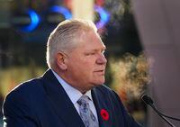 Ontario Premier Doug Ford holds a press conference regarding the gas tax at a gas station in Toronto on Tuesday, October 31, 2023. THE CANADIAN PRESS/Nathan Denette