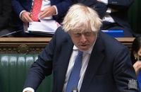 In this grab taken from video, Britain's Prime Minister Boris Johnson speaks during Prime Minister's Questions in the House of Commons, London, Wednesday, Dec. 8, 2021. Johnson says no U.K. government minister will attend the Beijing Olympics. Johnson on Wednesday called it “effectively” a diplomatic boycott. Johnson was asked in the House of Commons whether the U.K. will join the United States, Australia and Lithuania in a diplomatic boycott of the Winter Games. (House of Commons/PA via AP)