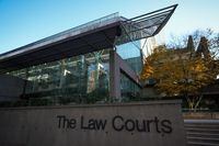 A lawyer representing the father of a 13-year-old girl killed in a Burnaby, B.C., park denies allegations that he brought a gun into court the day Ibrahim Ali was convicted of the killing. The Law Courts building, which is home to B.C. Supreme Court and the Court of Appeal, is seen in Vancouver, on Thursday, Nov. 23, 2023. THE CANADIAN PRESS/Darryl Dyck