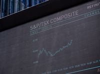 A stock ticker showing stock prices and the S&P/TSX Composite Index on June 1.