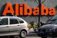 FILE - The Alibaba logo is seen outside a building in Beijing on Nov. 16, 2021. Alibaba, China’s biggest e-commerce company, said Tuesday, July 26, 2022, that it would apply for a primary listing in Hong Kong. (AP Photo/Ng Han Guan, File)