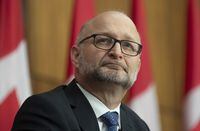 Justice Minister David Lametti takes part in a news conference in Ottawa, on Nov. 26, 2020.