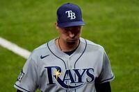 Tampa Bay Rays starting pitcher Blake Snell leaves the game against the Los Angeles Dodgers during the sixth inning in Game 6 of the World Series on Oct. 27, 2020, in Arlington, Texas.
