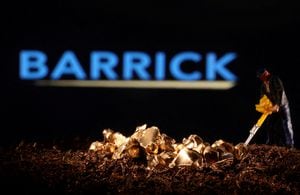 FILE PHOTO: A small toy figure and gold imitation are seen in front of the Barrick logo in this illustration taken November 19, 2021. REUTERS/Dado Ruvic/Illustration//File Photo