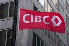 The CIBC logo displayed on a flag in front of its headquarters in Toronto on Oct. 25, 2021.