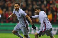 Barcelona's Pierre-Emerick Aubameyang, left, celebrates with teammate Pedri after scoring his side's second goal during the Europa League round of 16 second leg soccer match between Galatasaray and Barcelona in Istanbul, Turkey, Thursday, March 17, 2022. (AP Photo)