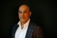 Canadian businessman and former Research In Motion co-CEO and chair Jim Balsillie is shown during an interview in Toronto, Monday, April 17, 2023. Balsillie is having his Hollywood moment. It was almost inevitable the day would come when the Waterloo, Ont., businessman would be portrayed by an actor recreating his role in the global success of the BlackBerry smartphone.THE CANADIAN PRESS/Cole Burston