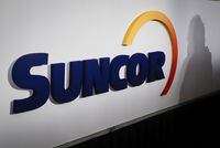 A Suncor logo is shown at the company's annual meeting in Calgary, Thursday, May 2, 2019.THE CANADIAN PRESS/Jeff McIntosh