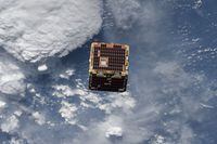 This NASA image released on September 20, 2018 shows the NanoRacks-Remove Debris satellite. - The International Space Station serves as humanity's orbital research platform, conducting a variety of experiments and research projects while in orbit around the planet.On June 20, 2018, the space station deployed the NanoRacks-Remove Debris satellite into space from outside the Japanese Kibo laboratory module. This technology demonstration was designed to explore using a 3D camera to map the location and speed of orbital debris or "space junk." The NanoRacks-Remove Debris satellite successfully deployed a net to capture a nanosatellite that simulates debris. Collisions in space could have have serious consequences to the space station and satellites, but research has shown that removing the largest debris significantly reduces the chance of collisions. (Photo by HO / NASA / AFP) / RESTRICTED TO EDITORIAL USE - MANDATORY CREDIT "AFP PHOTO / NASA" - NO MARKETING NO ADVERTISING CAMPAIGNS - DISTRIBUTED AS A SERVICE TO CLIENTSHO/AFP/Getty Images