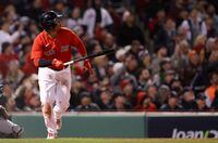 BOSTON, MASSACHUSETTS - OCTOBER 18: Rafael Devers #11 of the Boston Red Sox hits a home run against the Houston Astros in the eighth inning of Game Three of the American League Championship Series at Fenway Park on October 18, 2021 in Boston, Massachusetts. (Photo by Maddie Meyer/Getty Images)