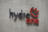 A Hydro One sign is seen on the wall of a building at 483 Bay St. in downtown Toronto, on July 10, 2017.