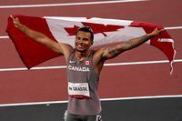 Canada's Andre De Grasse reacts after his bronze medal finish in the men's 100m final event during the Tokyo Summer Olympic Games, in Tokyo on August 1, 2021. THE CANADIAN PRESS/Nathan Denette