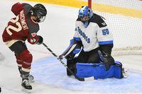 Toronto goaltender Kristen Campbell (50) stops Montreal's Kennedy Marchment during first period PWHL hockey action in Montreal, Saturday, January 20, 2024. THE CANADIAN PRESS/Graham Hughes