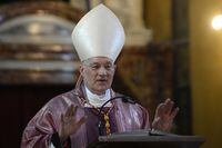 Canadian cardinal Marc Ouellet leads a mass at the Santa Maria in Traspontina church in Rome, March 10, 2013. (Photo by FILIPPO MONTEFORTE/AFP via Getty Images)