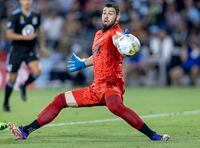 The ball goes past Los Angeles FC goalkeeper Maxime Crépeau on a shot by Los Angeles FC but stays out of the net during the first half of an MLS soccer match Tuesday, Sept. 13, 2022, in St. Paul, Minn. (Carlos Gonzalez/Star Tribune via AP)