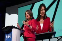 Alberta Premier Danielle Smith gives a keynote address at the the LNG2023 conference in Vancouver, on Thursday, July 13, 2023. THE CANADIAN PRESS/Darryl Dyck
