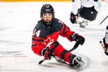 Raphaelle Tousignant, the first woman to play for Canada's national para hockey team, in action against South Korea at the world championships in Moose Jaw, Sask., Monday, May 29, 2023. THE CANADIAN PRESS/HO-Hockey Canada Images-Erica Perreaux **MANDATORY CREDIT** 
