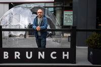 Restaurant owner John Sinopoli, stands for a photo outside his restaurant Gare de L'Est in Toronto on October 29, 2020.  Aaron Vincent Elkaim / The Globe and Mail