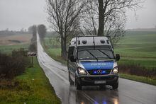 PRZEWODOW, POLAND - NOVEMBER 16: A police van patrols side roads next to the missile explosion site on November 16, 2022 in Przewodow, Poland. Poland convenes a meeting of its national security council amid reports that stray missiles hit its territory, killing two people. Russia's defense ministry has denied that its missiles hit the NATO member state, but moments after, Polish ministry confirmed it was a Russian-produced missile. (Photo by Omar Marques/Getty Images)