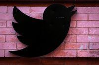 FILE PHOTO: FILE PHOTO: The Twitter logo is seen outside the offices in New York City, U.S., November 9, 2022. REUTERS/Brendan McDermid/File Photo/File Photo