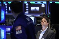 Traders work on the floor of the New York Stock Exchange (NYSE) in New York City, U.S., July 11, 2022.  REUTERS/Brendan McDermid