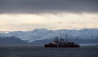 A Coast Guard ship sits at anchor off the hamlet of Pond Inlet, Nunavut, on Aug. 23, 2014.