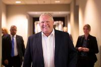Ontario Premier Doug Ford walks into a holding room before speaking to journalists to share his achievements in government, in Toronto, on Friday June 7, 2019, on the one year anniversary of him taking office. THE CANADIAN PRESS/Chris Young