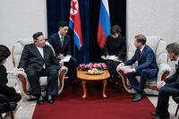 This handout photograph taken and released by Ministry of Natural Resources and Environment of Russia on September 12, 2023, shows North Korea's leader Kim Jong Un (L) attending a meeting with Russia's Minister of Natural Resources and Environment Alexander Kozlov (2ndR) in Khasan, Primorky region, at the start of his official visit to Russia. North Korean leader Kim Jong Un arrived in Russia on September 12, 2023 ahead of a meeting with President Vladimir Putin that the United States has warned could see an arms deal to support Moscow's assault on Ukraine. (Photo by Handout / RUSSIAN ENVIRONMENT MINISTRY / AFP) / RESTRICTED TO EDITORIAL USE - MANDATORY CREDIT "AFP PHOTO / RUSSIAN ENVIRONMENT MINISTRY" - NO MARKETING NO ADVERTISING CAMPAIGNS - DISTRIBUTED AS A SERVICE TO CLIENTS (Photo by HANDOUT/RUSSIAN ENVIRONMENT MINISTRY/AFP via Getty Images)