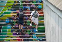Two people make their way up a painted staircase in Ottawa on Monday, July 19, 2021. THE CANADIAN PRESS/Sean Kilpatrick