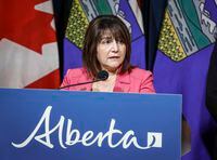 Alberta Minister of Health Adriana LaGrange speaks to the media in Calgary on Tuesday, Sept. 12, 2023. She says says the Alberta government is fundamentally restructuring health care because the system "is not working." THE CANADIAN PRESS/Jeff McIntosh